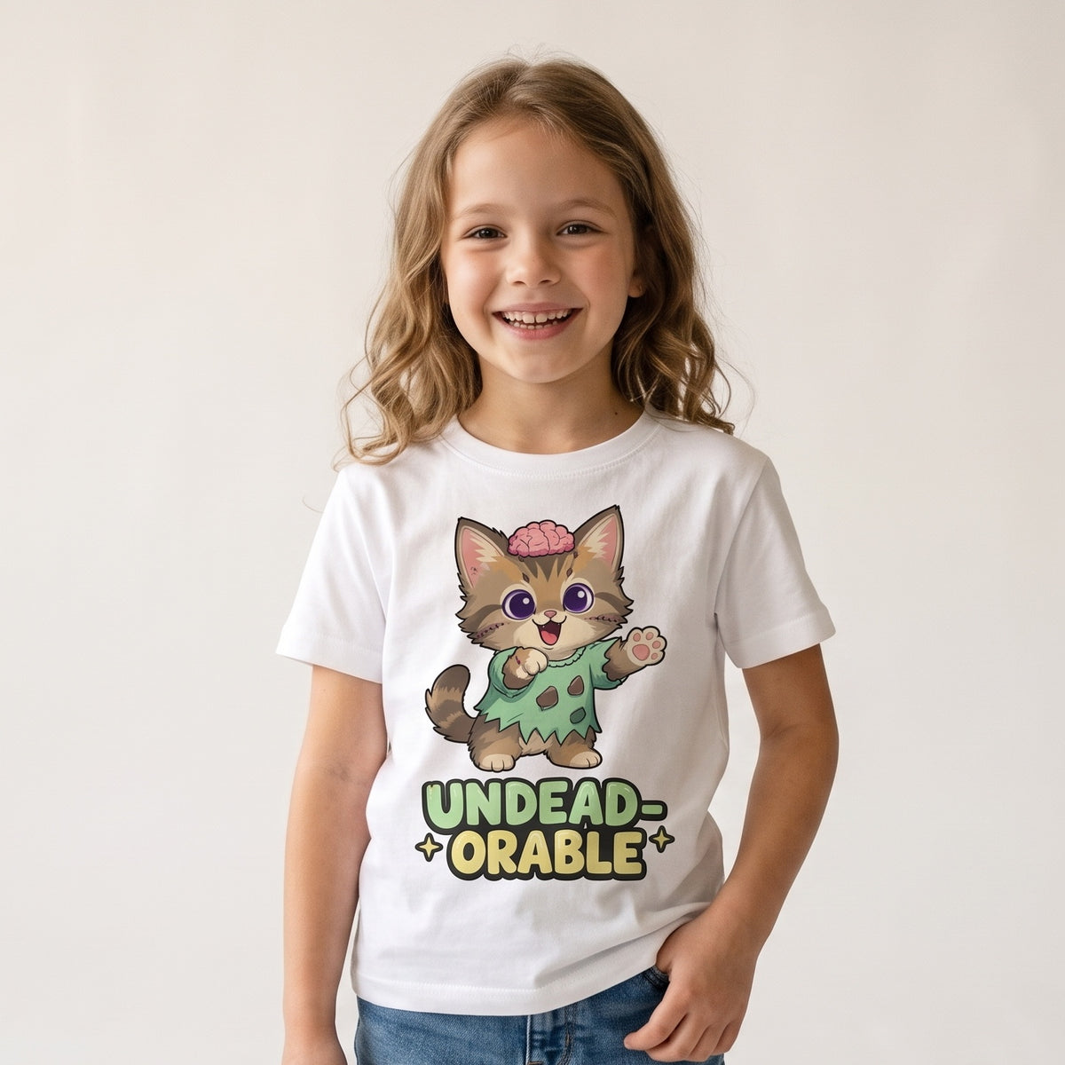 Child wearing the Undead-orable Zombie Kitten Kids Halloween T-Shirt